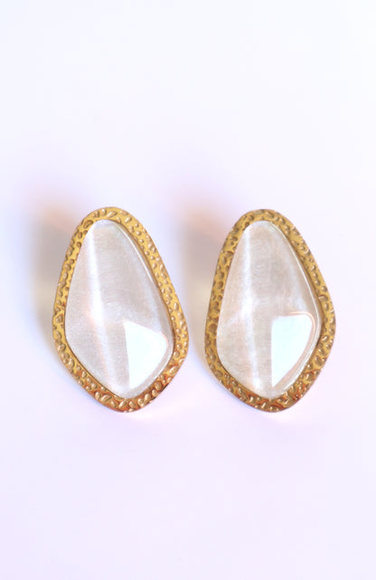 Brincos Aura